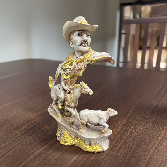 Rustic Western Cowboy Figurine with Golden Accents – Unique Decorative Statue