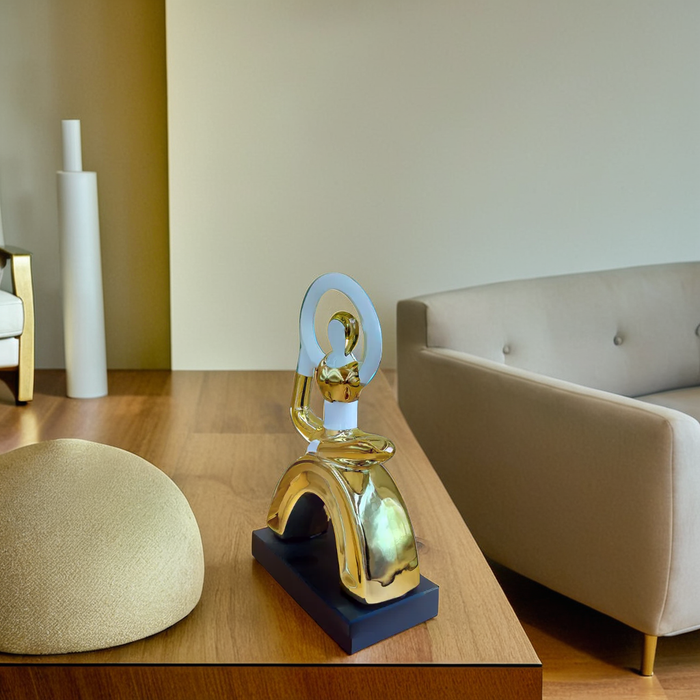 Modern Golden Yoga Figurine – A Stunning Fusion of Art and Serenity